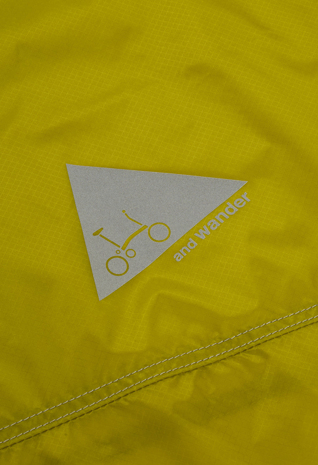 and wander x Brompton Sil Poncho - Yellow Green